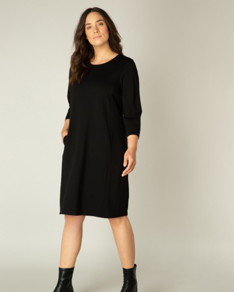 Front of a model wearing a size 5(58/60) Addy in Black by Base Level Curvy. | dia_product_style_image_id:253219